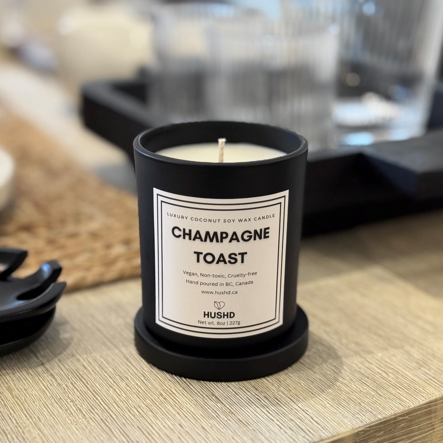 Celebrate with Champagne Toast, a luxury coconut soy candle with citrus, apple blossom & amber. Hand-poured in Canada.