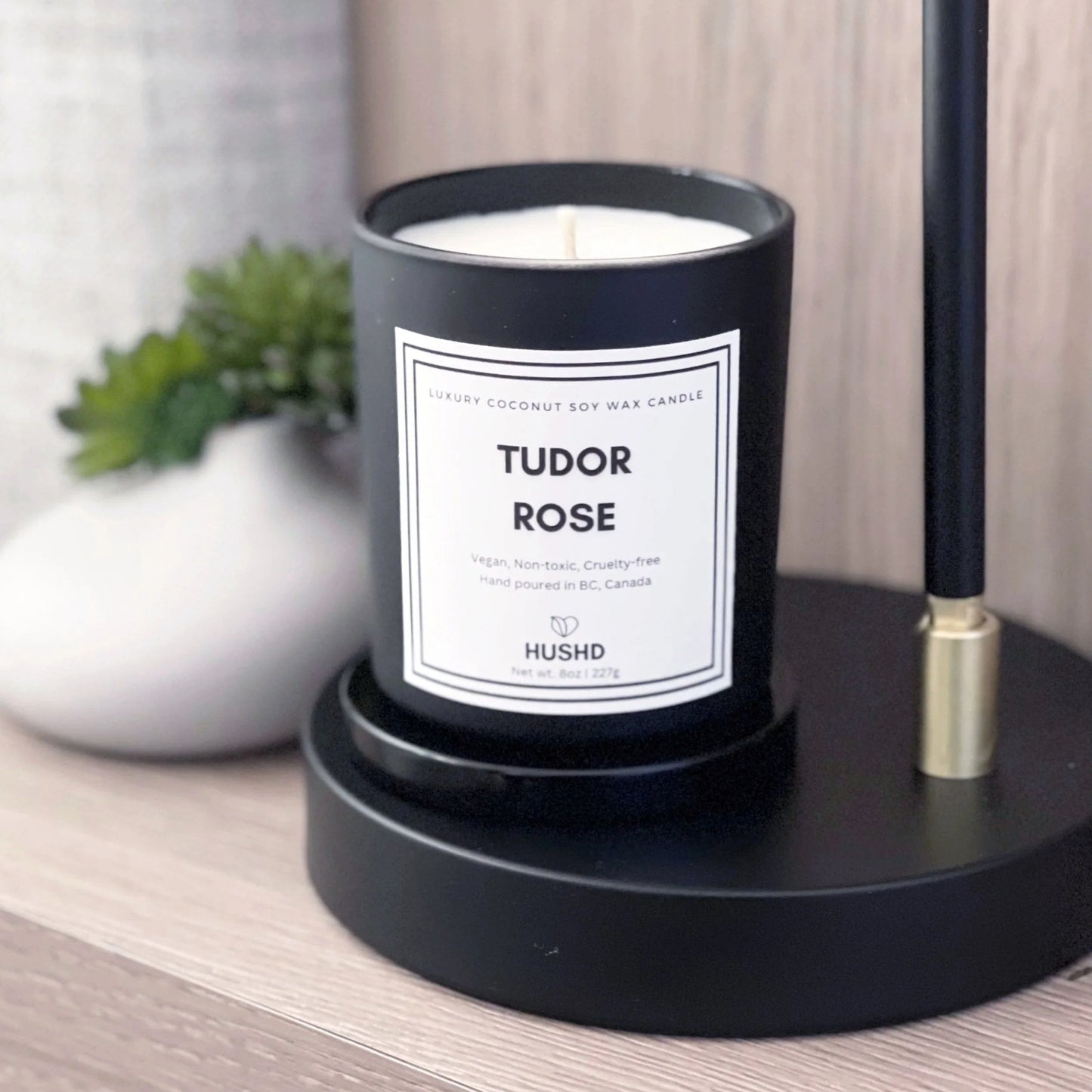 Luxury Tudor Rose candle made with vegan coconut soy wax, blending rose and amber fragrance. Show our Canadian made candle now.