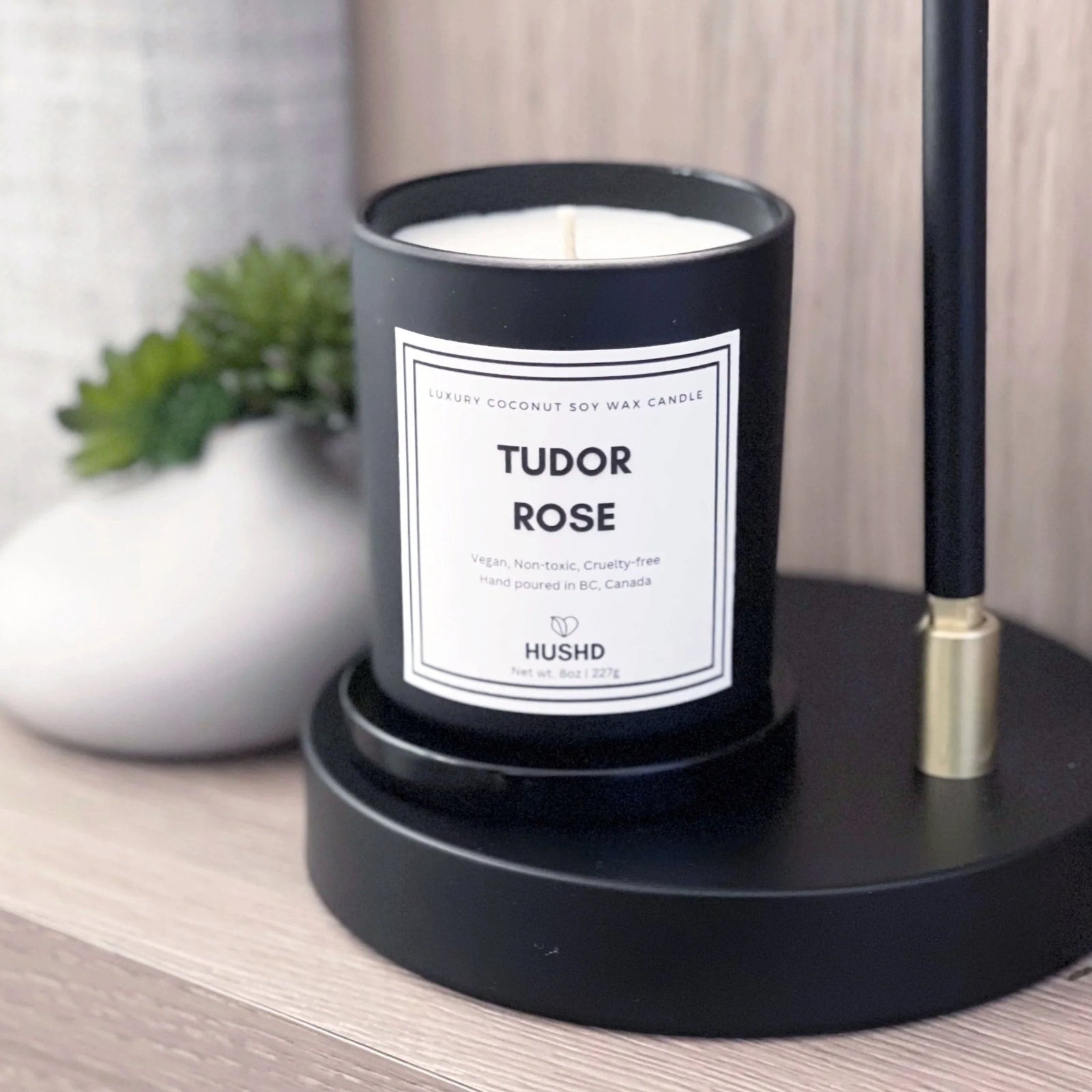 Luxury Tudor Rose candle made with vegan coconut soy wax, blending rose and amber fragrance. Show our Canadian made candle now.