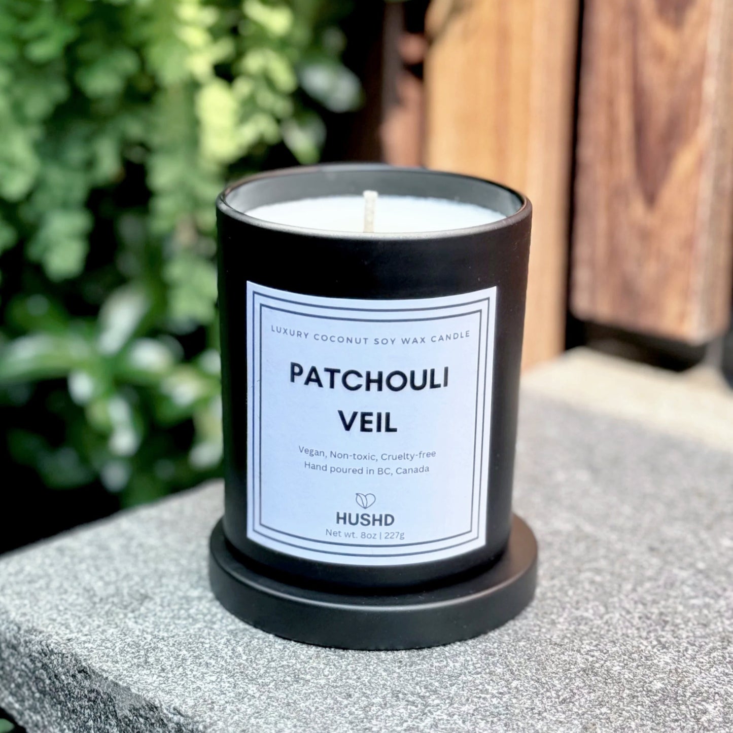 Patchouli Veil luxury coconut soy candle with rose, jasmine & cedar notes. Hand-poured in Canada for a rich, warm glow.